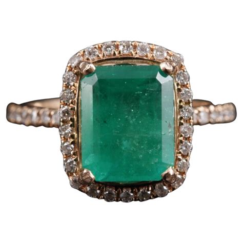 Antique Emerald Engagement Rings .